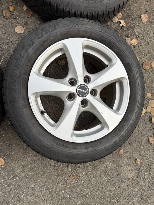 Felgi aluminiowe 5x105 z oponami zimowymi 205/60R16 Opel Astra J ET40