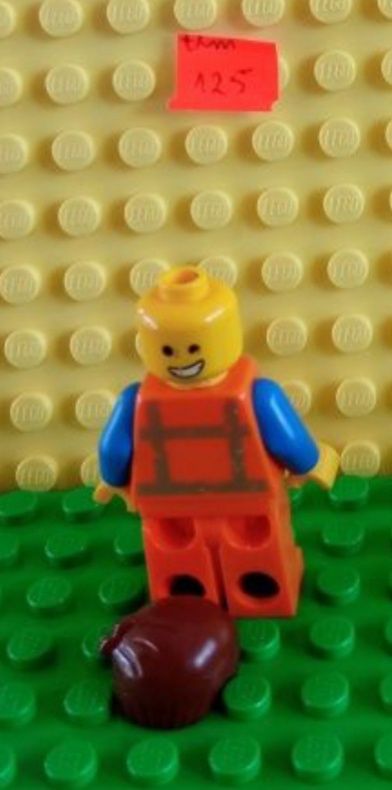 Lego mini figurka Emmet tlm125