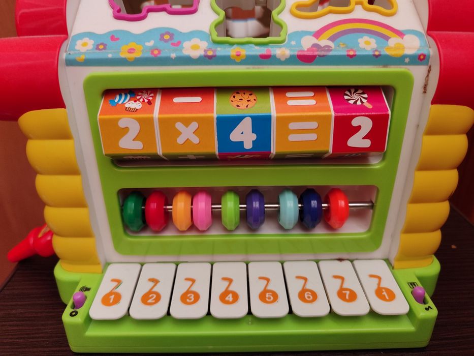 Дитячий розвиваючий, музичний будиночок сортер.