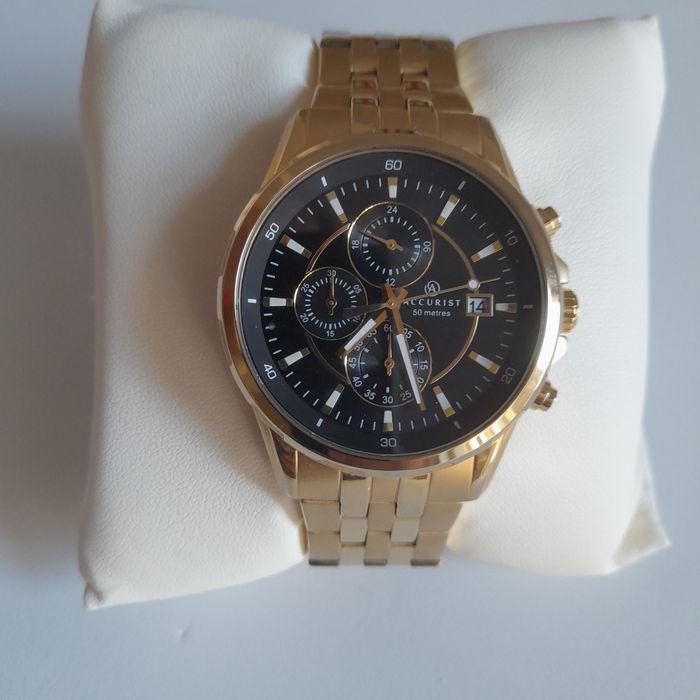 Relogio dourado accurist