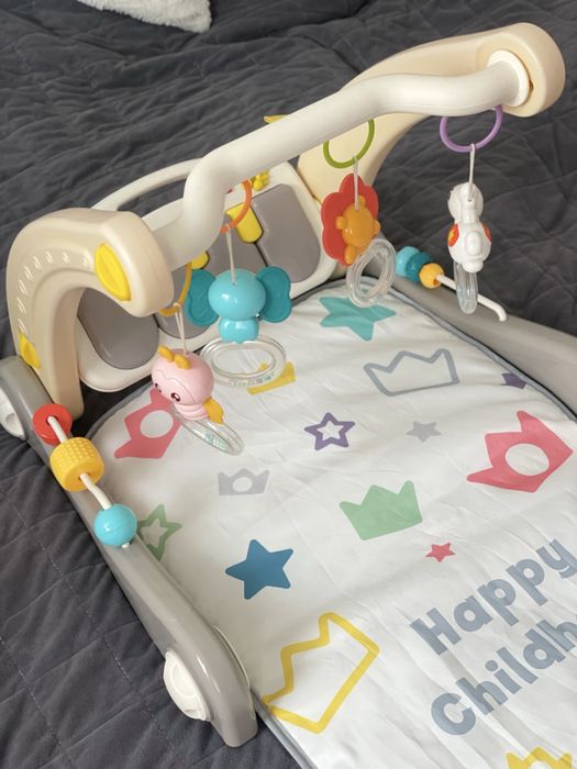 Килим для ігор та толокар 2 в 1 .