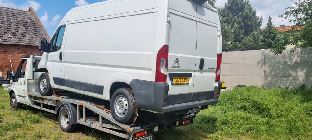 Pomoc drogowa. Usługi. Autolaweta. Transport aut