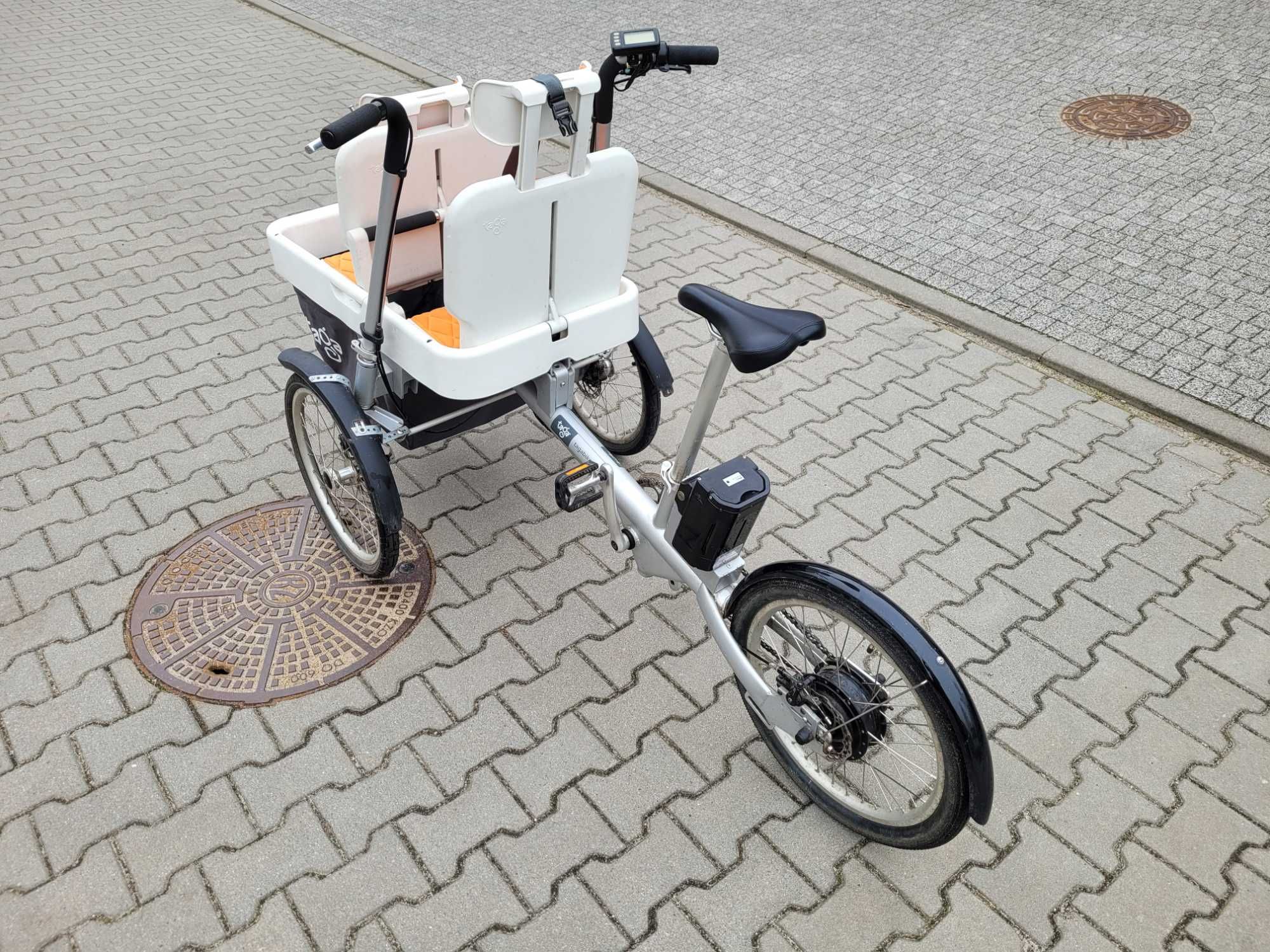 Rower rodzinny trójkołowy towarowy (cargo) elektryczny Taga Bike