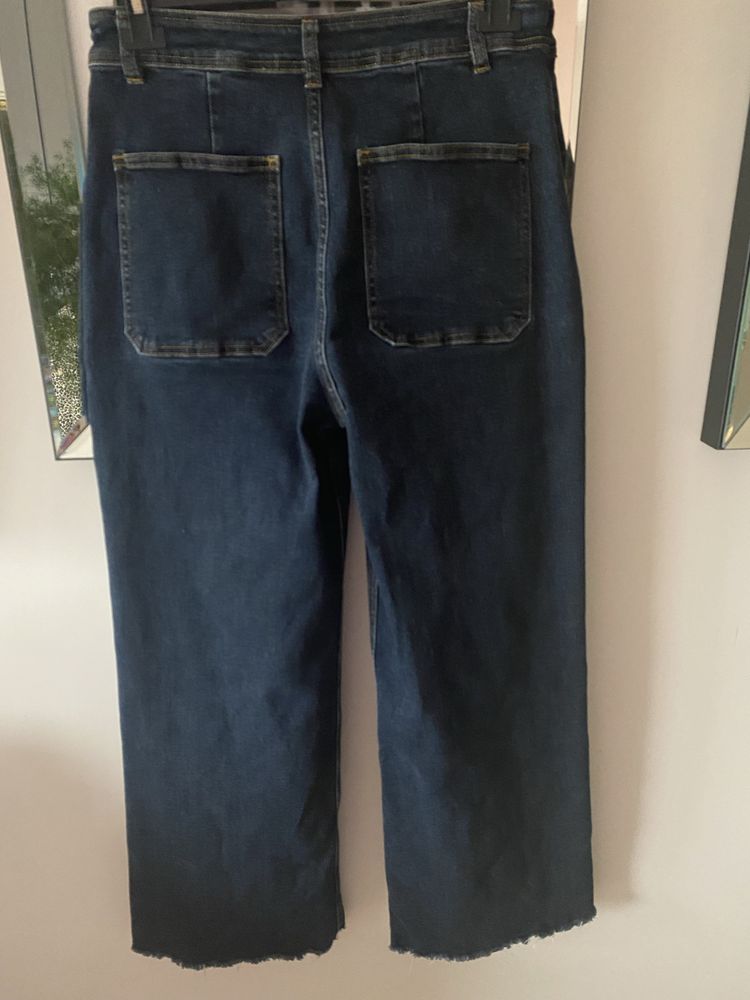 Butik jeansy dzwony wysoki stan nowa kolekcja L 40/42