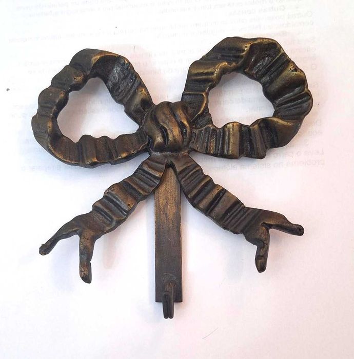 Suporte de parede para prato em bronze