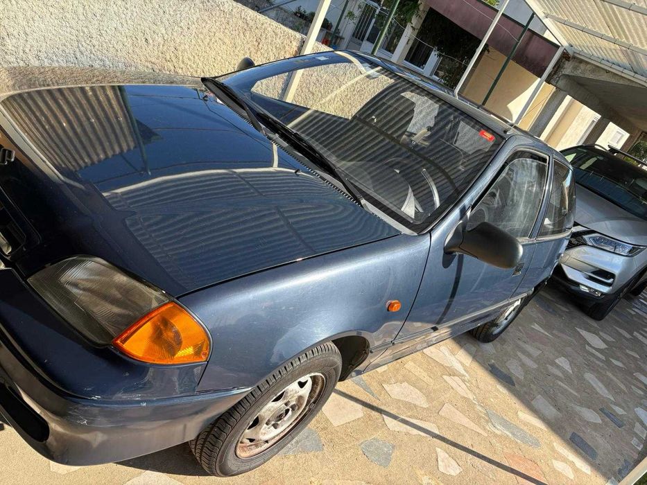 Suzuki Swift com poucos km e em boas condições
