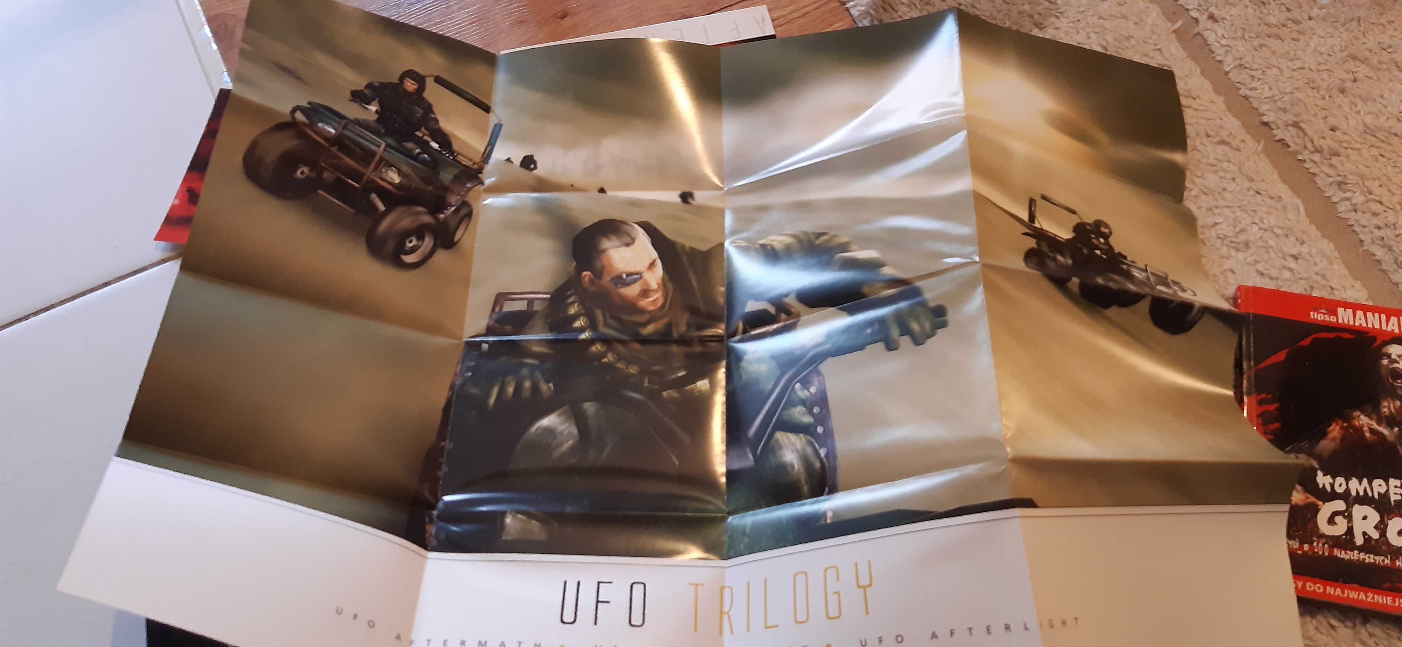 gadżety z gry ufo trylogy, notebook arty i plakat