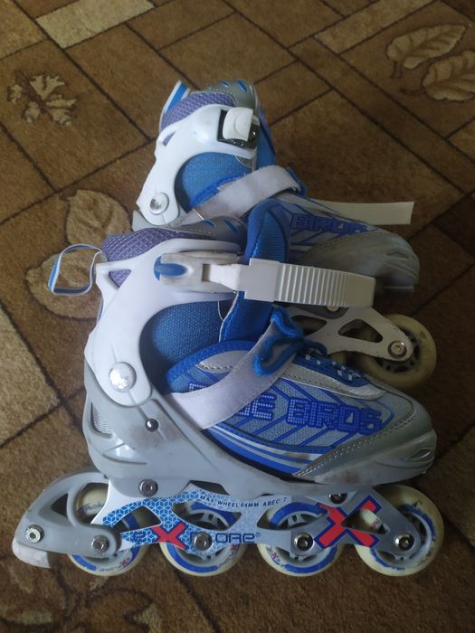 Роликовые коньки