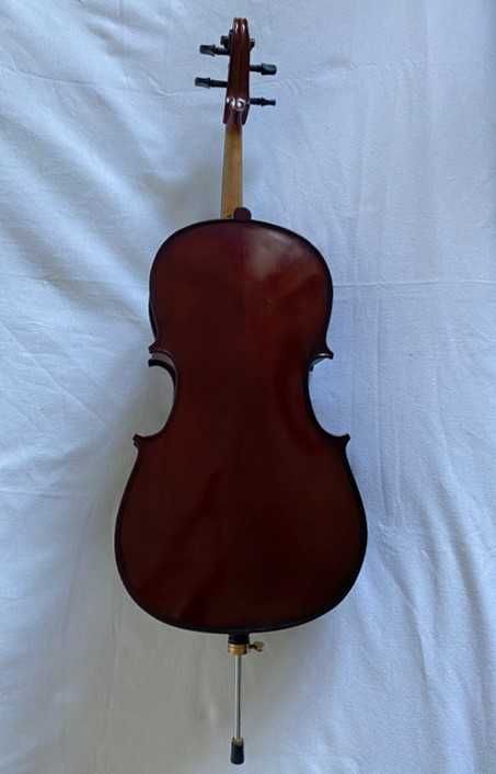 Violoncelo 1/8, arco, e mala de transporte.
