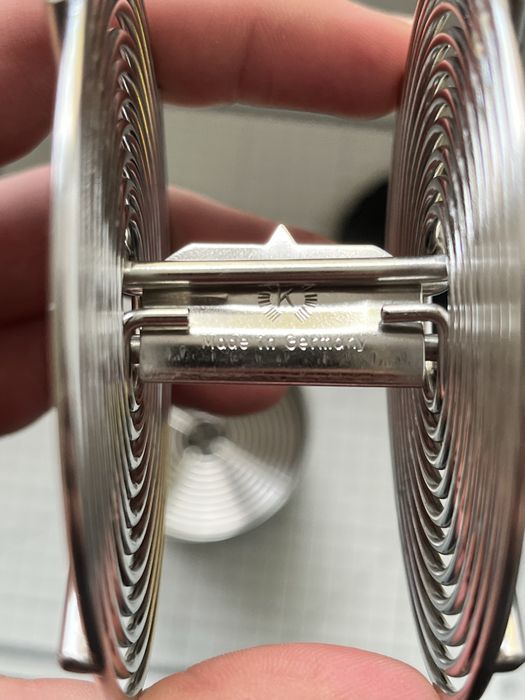 Koreks stalowy i dwie szpule do wywoływania filmow 35mm