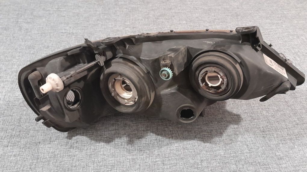 Lampa opel astra g lewy przód Hella