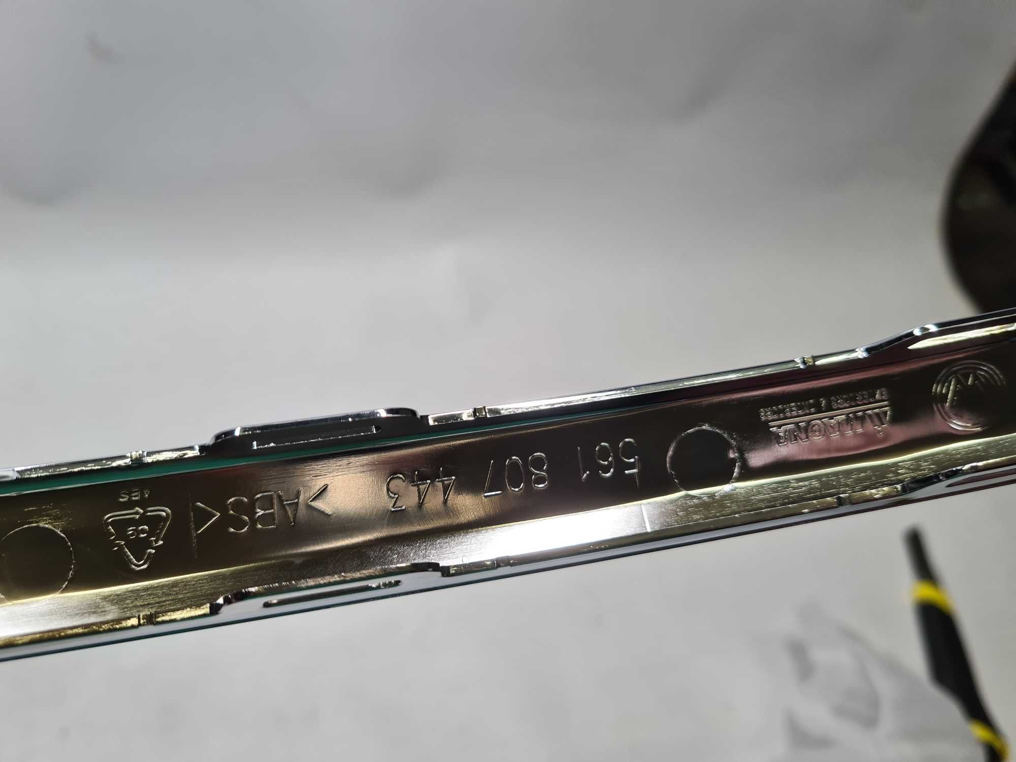 Listwa zderzaka tył środkowa VW Passat B7 chrom 11-15 nowa OE sedan