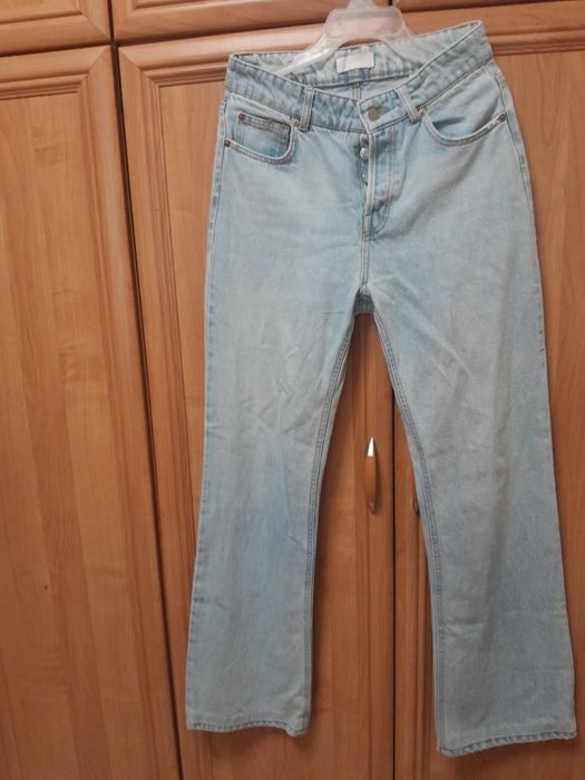 Nowe bez metki jeansy damskie dzwony z H&M