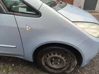Mitsubishi Colt Z30 CZ3 04-08 - Błotnik prawy przód T42