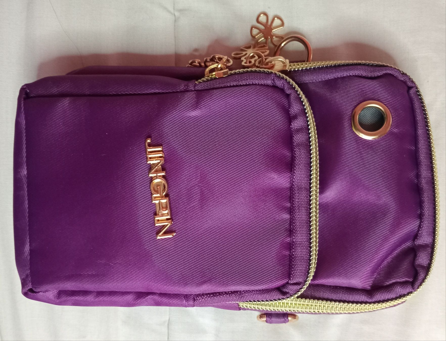 Bolsa tira colo compacta NOVA