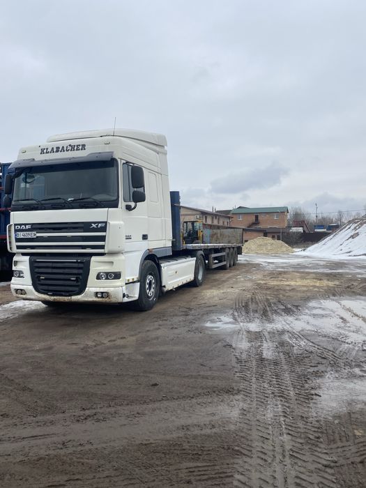 Вантажні перевезення платформа площадка тент