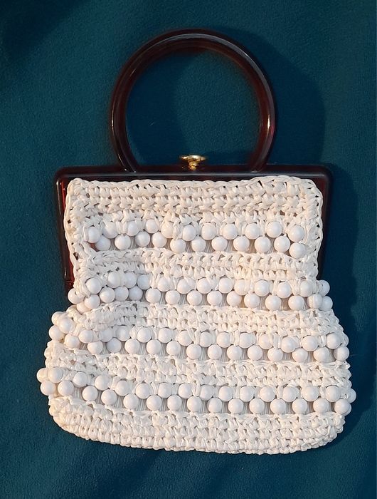 Pochete feminina anos 60