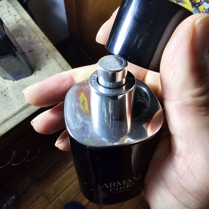 Vendo Armani code parfum 50ml recarregável e garrafa recarregável 150m