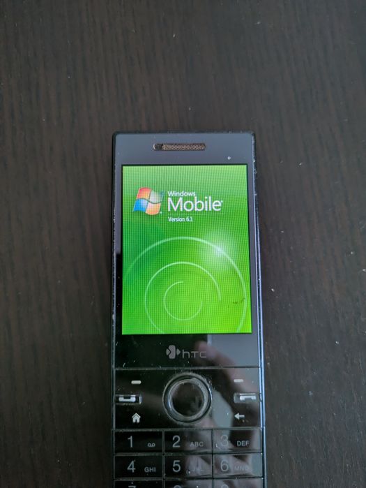 Telemóvel antigo HTC S740 a funcionar