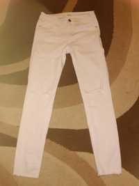 Spodnie białe rurki M z dziurami