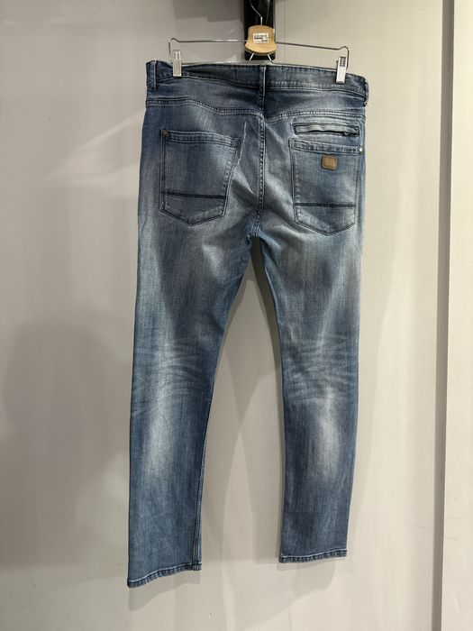 Męskie spodnie jeansowe Reserved rozm W34 L32 rozm L