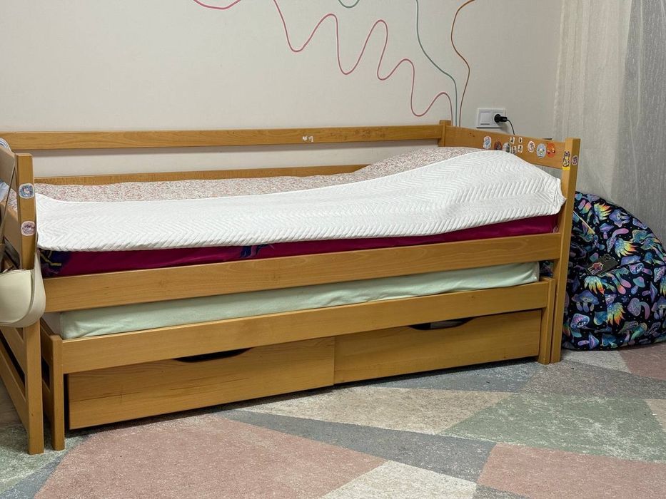 Ліжко з двома спальними місцями