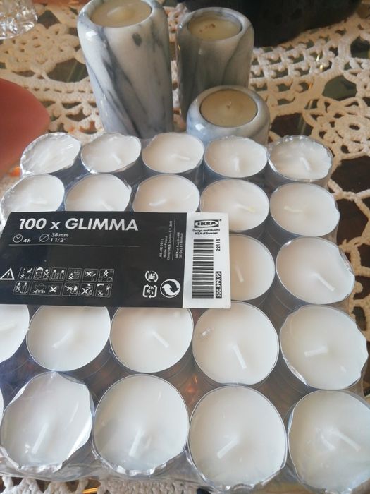 Velas e suportes em marmore