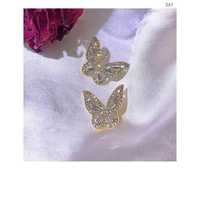 Модні жіночі сережки-метелики