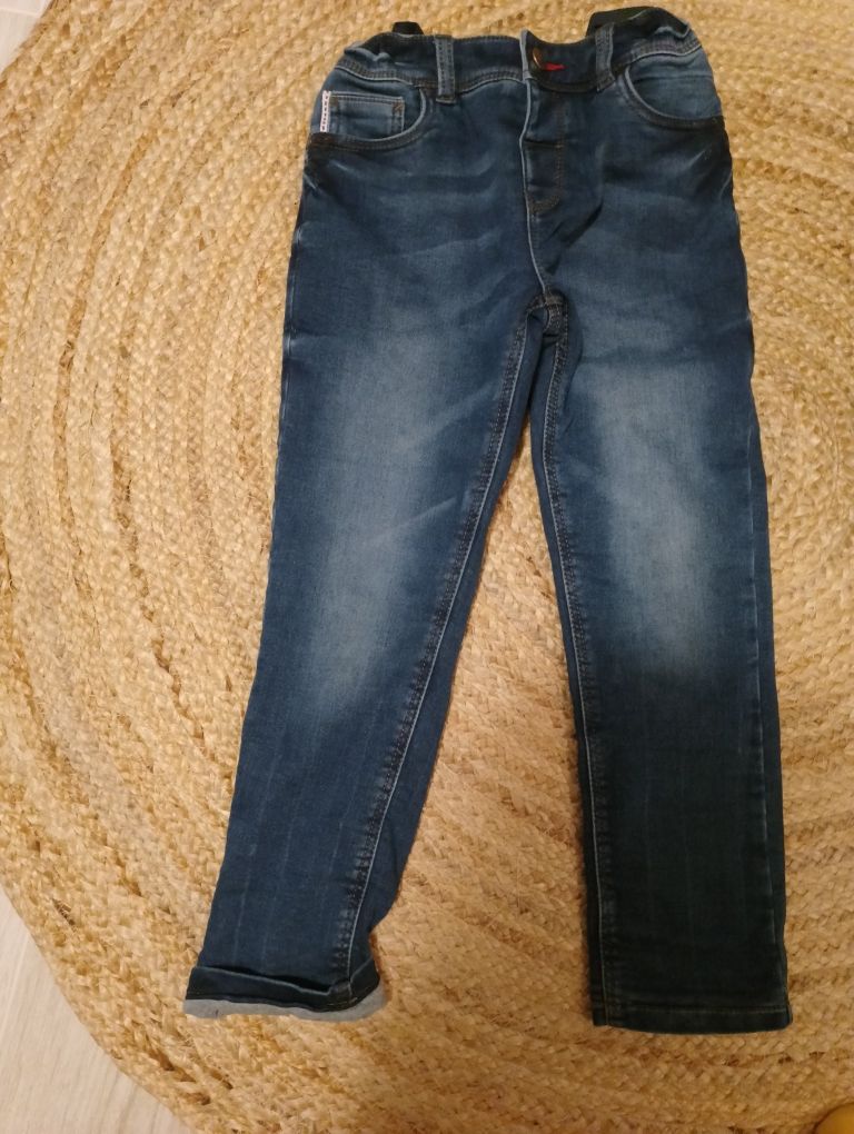 Spodnie jeansowe 122 ocieplane dla chłopca jak nowe c&a granatowe