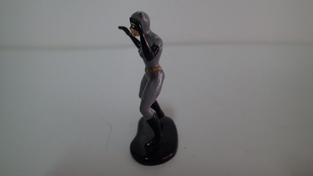 Boneco em chumbo "Batman" e "Batgirl"