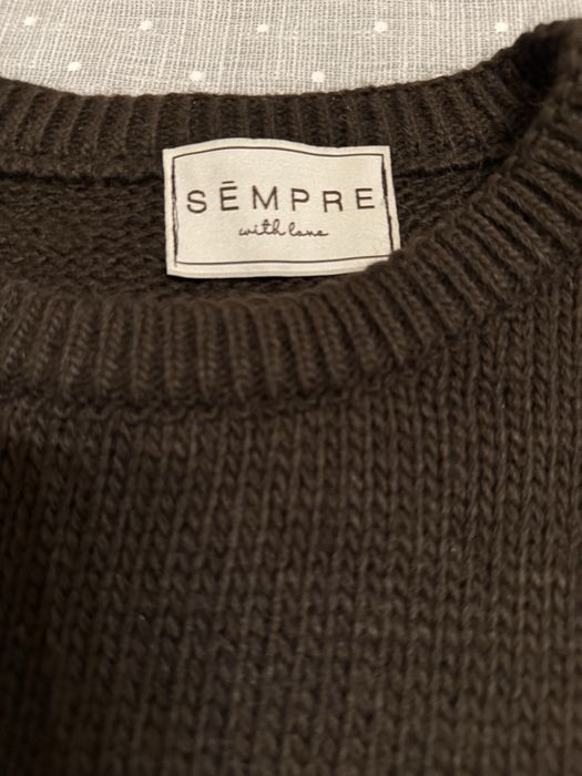 Жіночий вʼязаний прогулянковий костюм