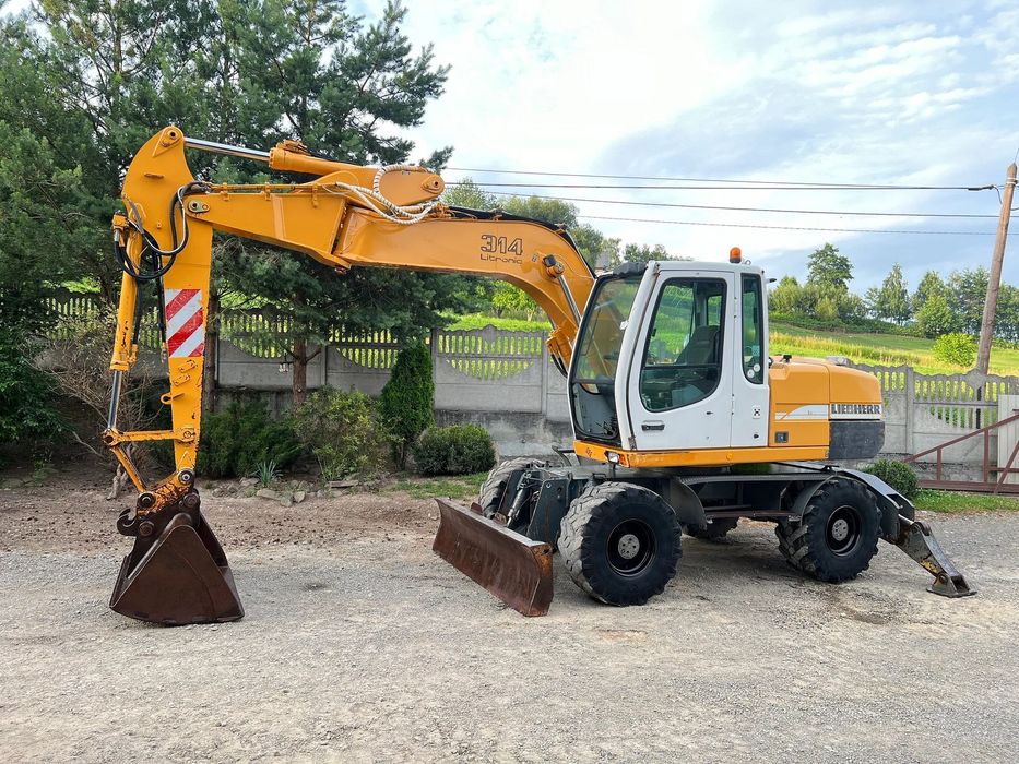 Liebherr A314 LITRONIC Koparka Kołowa 16 Ton 2 Łyżki Pług Podpory  Stan Dobry Sprowadzona Skrętne Ramię ! CENA BRUTTO ! A316