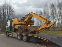 Pomoc drogowa laweta transport pojazdów maszyn rolniczych budowlanych