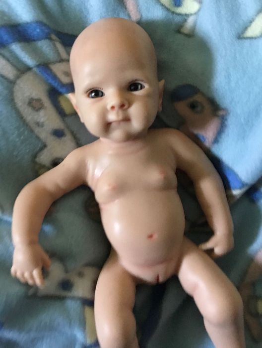 Boneca bebé reborn,verdadeiro silicone (artigos novos)