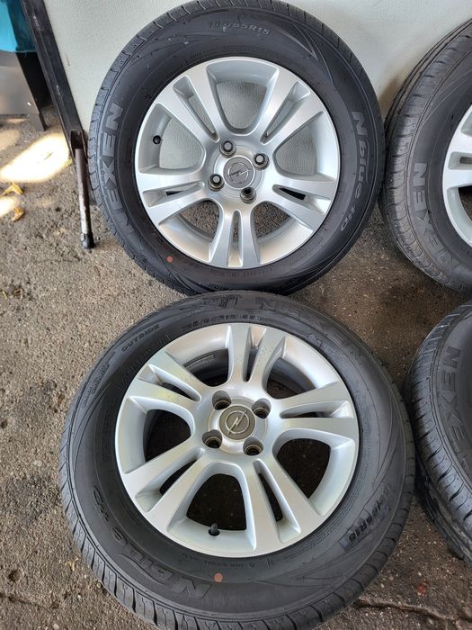 Koła felgi opony 4x100 185/65r15 23r 7.9mm