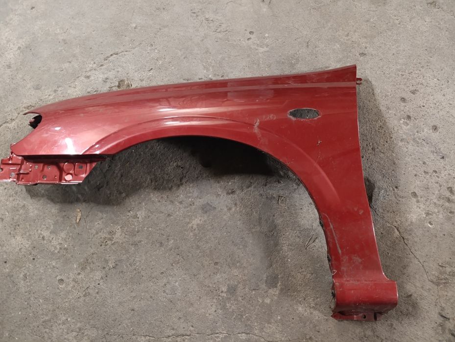 Lewy błotnik , nissan almera