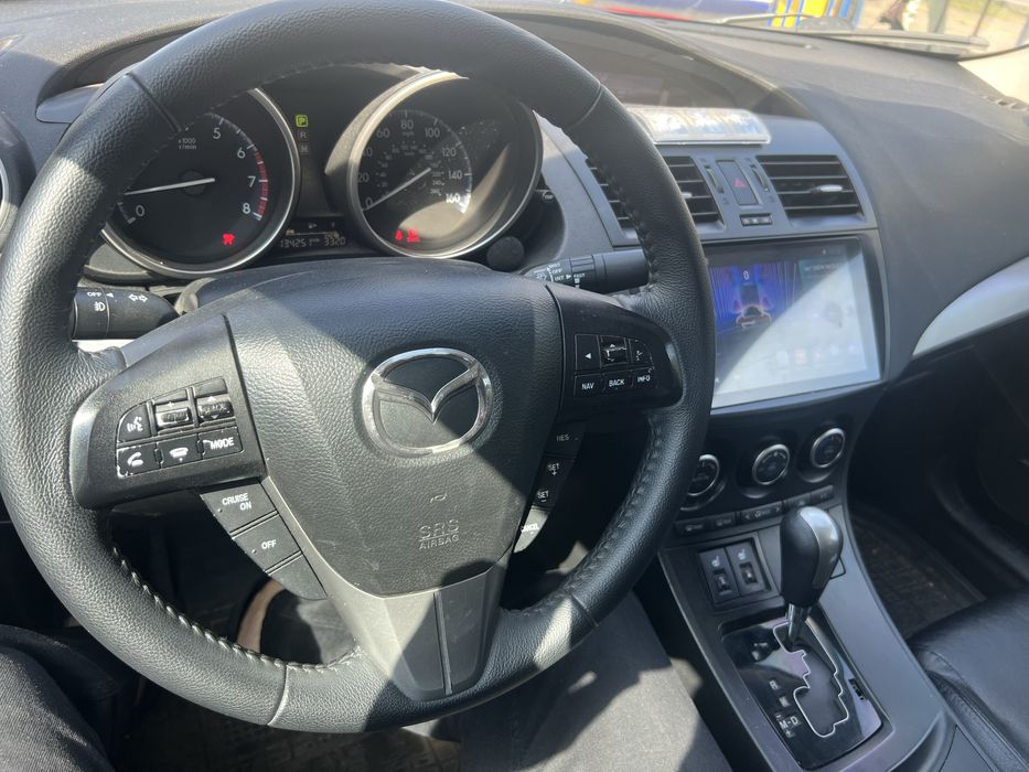 Мазда 3 комплектация топ