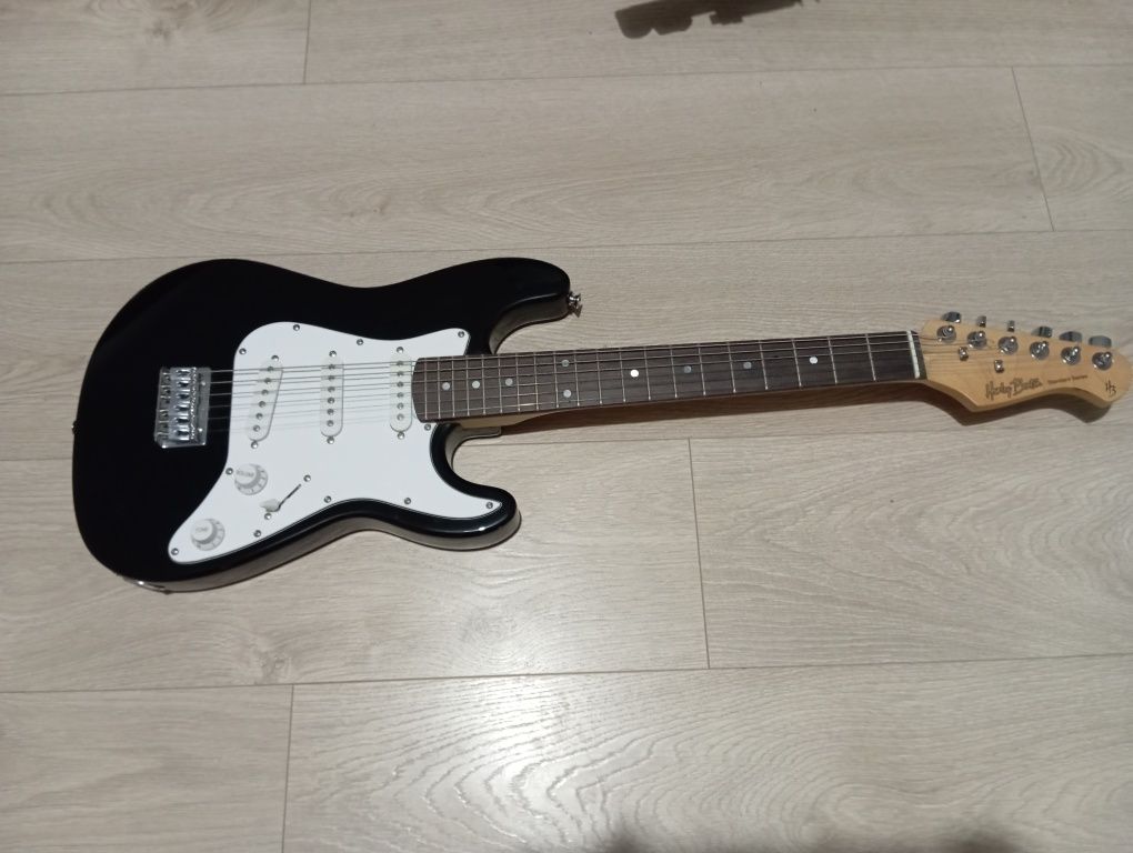 Gitara Harley Benton dla dzieci, kostka, stojak, pasek