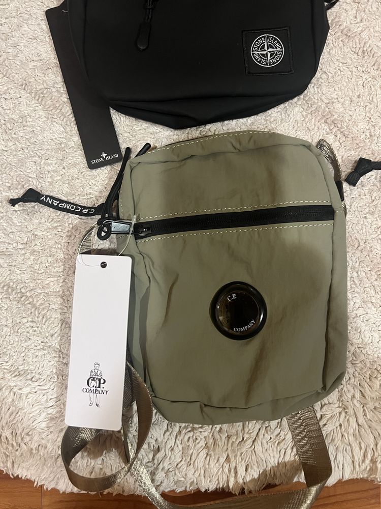 Роспродаж сумок  TNF,C.P, Ston