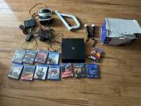 ZESTAW PlayStation 4 Pro 1TB + VR + Logitech G29 + 13 GIER + Akcesoria