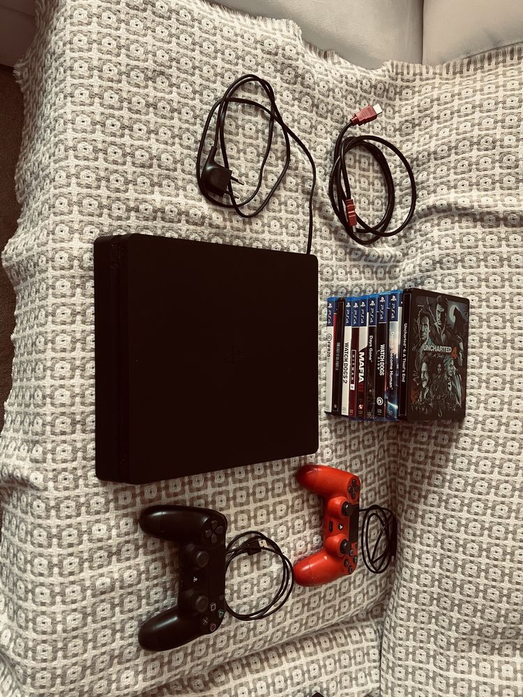 PS4 com 2 comandos e 10 jogos