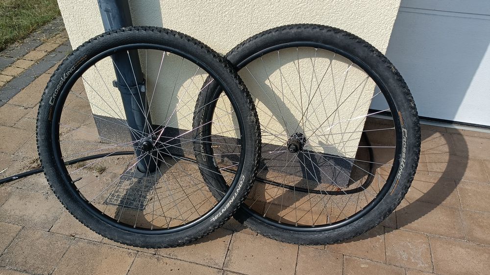 Komplet koła MTB 29" 11rz pod tarcze qr z oponami tubeless Continental