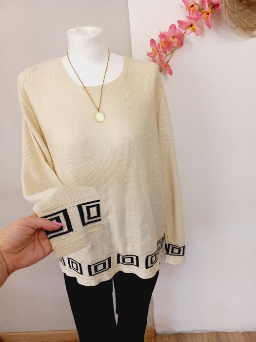 Swetrek kremowy 2xl.stan idealny