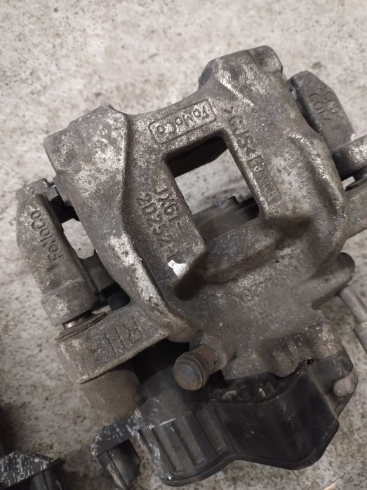 Zacisk hamulcowy tył Ford Focus MK4 Kombi