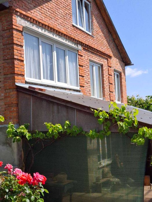 Продам цегляний будинок в Лезнево з приватизованою ділянкою. 34333