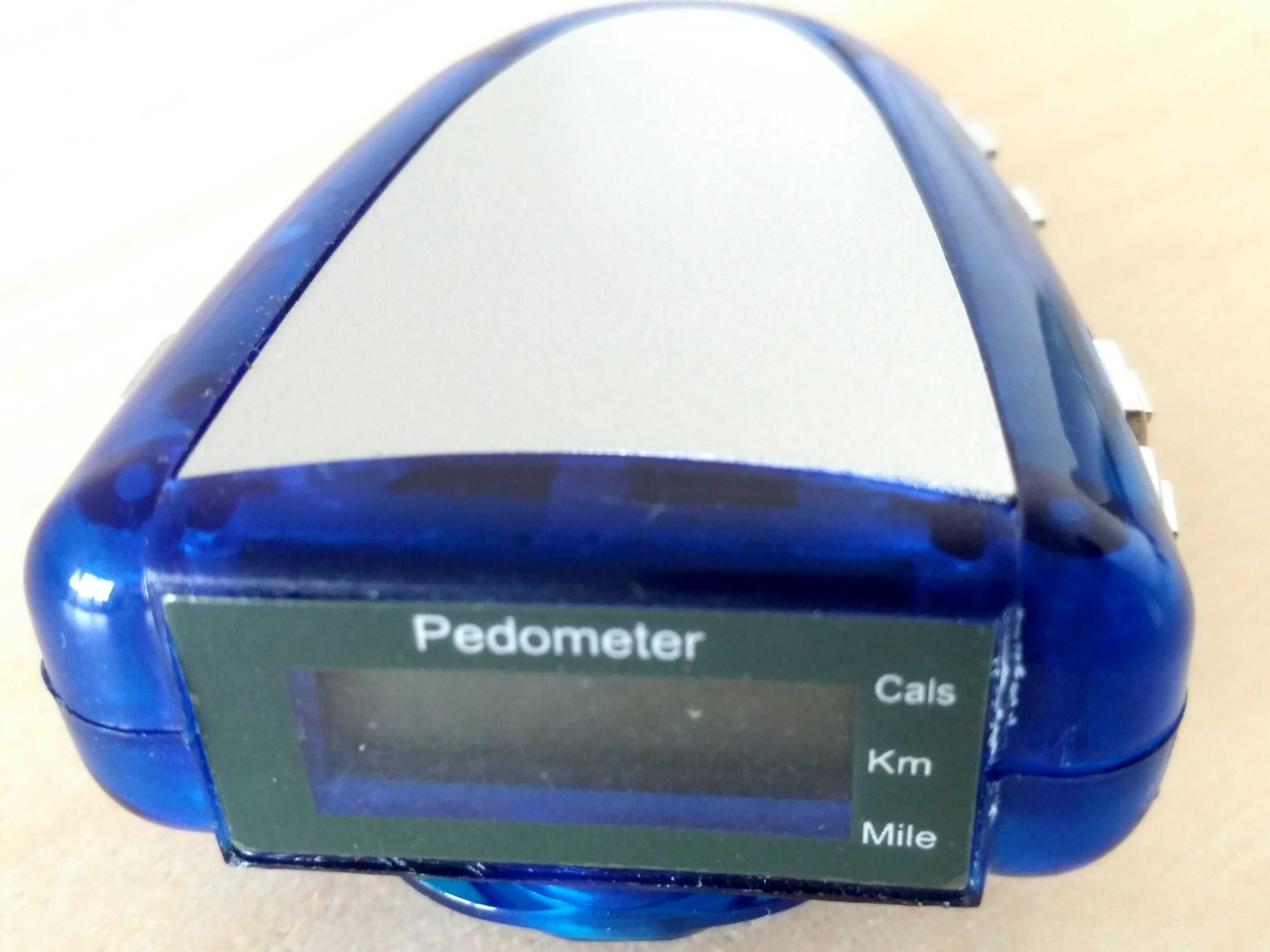 Pedometer with FM scan radio