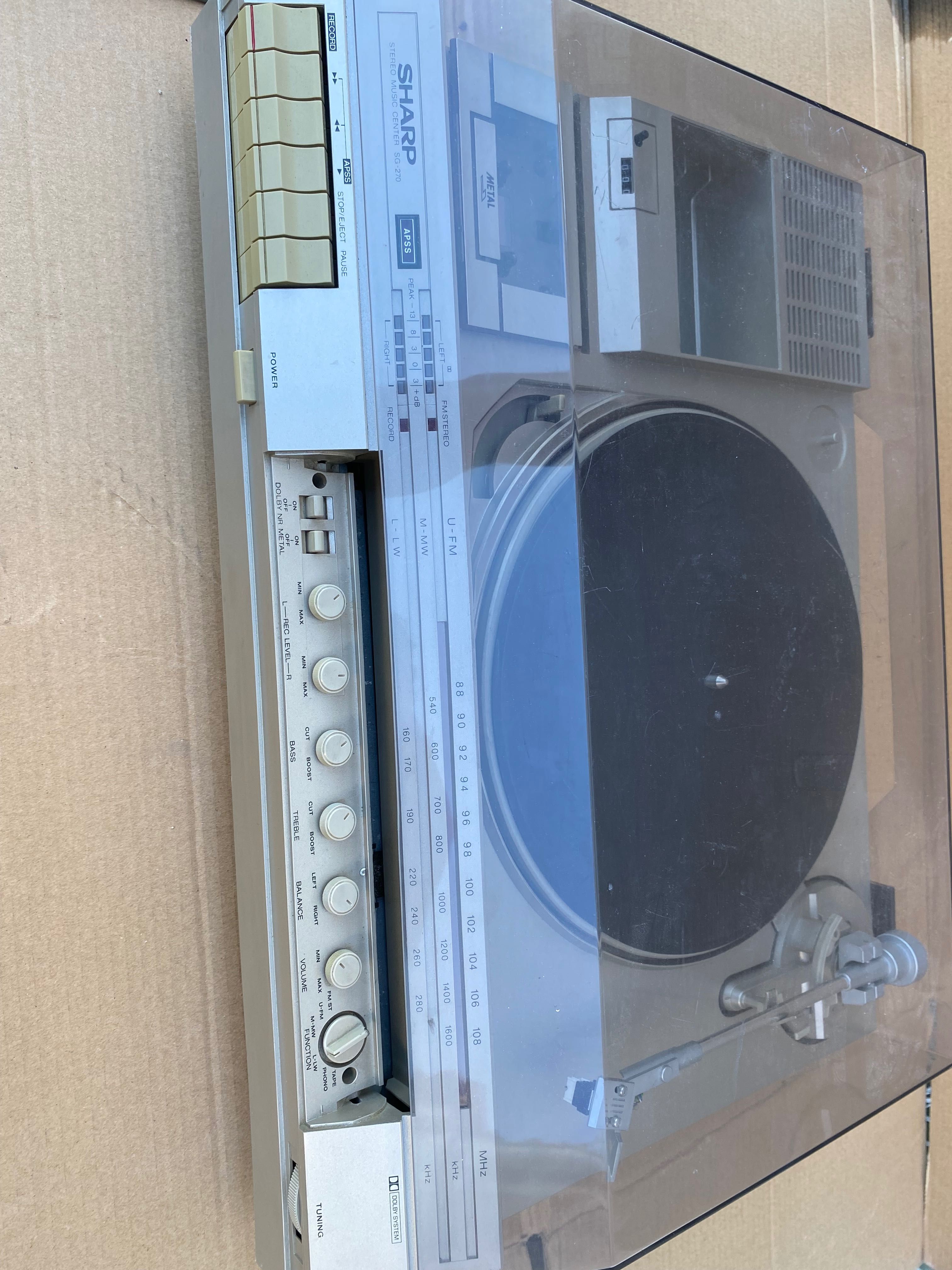 Gira discos Sharp stereo music center Sg-270