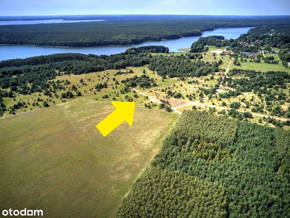 Sprzedam działkę rekreacyjną 871 m² nad jeziorem Dołgie