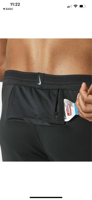 Нові оригінальні менакруті штани для бігу nike swift shield