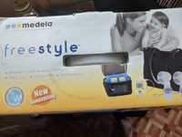 Молокоотсос  Medela freestyle